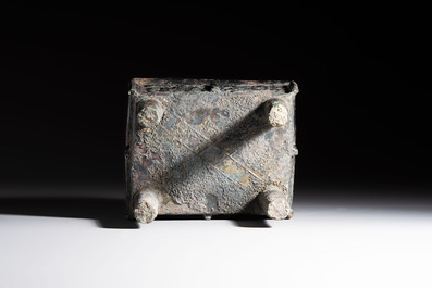 An inscribed Chinese archaic bronze food vessel with Taotie design, Ding 鼎, Western Zhou