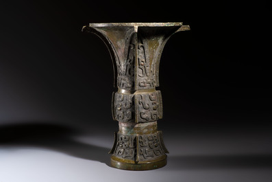A Chinese archaic bronze wine vessel with Taotie design, Zun 尊, late Shang