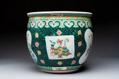 A Chinese famille verte black-ground jardini&egrave;re with birds, antiquities and flowers, 19th C.