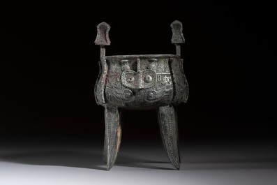 A Chinese archaic bronze wine vessel with owl design, Jia 斝, late Shang