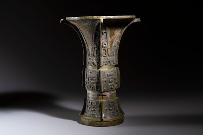 A Chinese archaic bronze wine vessel with Taotie design, Zun 尊, late Shang