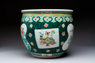 A Chinese famille verte black-ground jardini&egrave;re with birds, antiquities and flowers, 19th C.