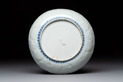 A fine Chinese blue and white moulded Kraak porcelain dish with incised 'Pomegranates' rim, Wanli