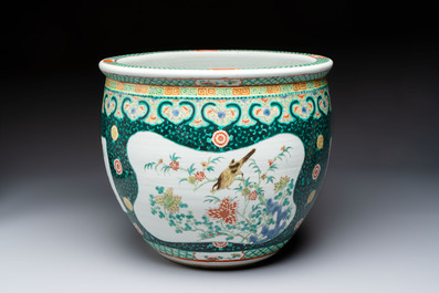 A Chinese famille verte black-ground jardini&egrave;re with birds, antiquities and flowers, 19th C.