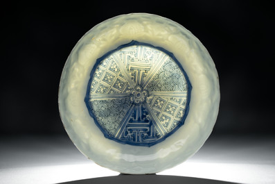 A fine Chinese blue and white moulded Kraak porcelain dish with incised 'Pomegranates' rim, Wanli
