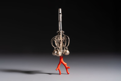 A silver red coral-mounted children's rattle-whistle, 19th C. or earlier
