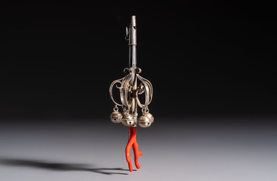 A silver red coral-mounted children's rattle-whistle, 19th C. or earlier
