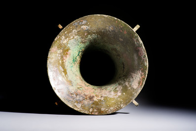A Chinese archaic bronze wine vessel with Taotie design, Zun 尊, late Shang