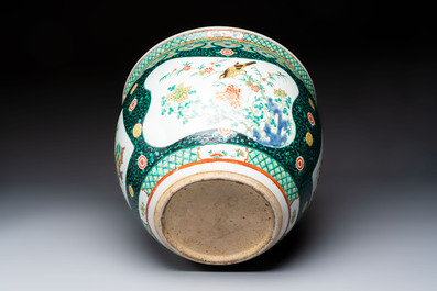 A Chinese famille verte black-ground jardini&egrave;re with birds, antiquities and flowers, 19th C.