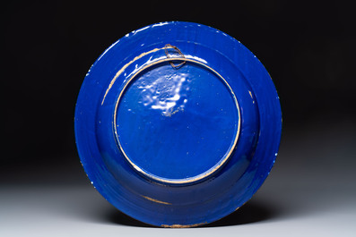 A rare large Nevers white-splashed blue-ground '&agrave; la bougie' dish, France, late 17th C.