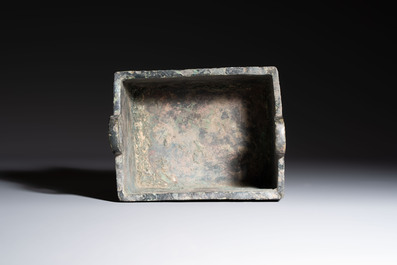 An inscribed Chinese archaic bronze food vessel with Taotie design, Ding 鼎, Western Zhou