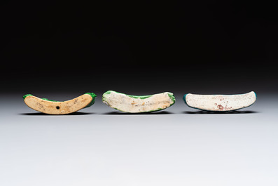Three Chinese verte biscuit and turquoise-glazed brush rests, Kangxi and later