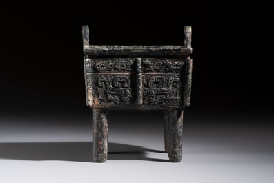 An inscribed Chinese archaic bronze food vessel with Taotie design, Ding 鼎, Western Zhou