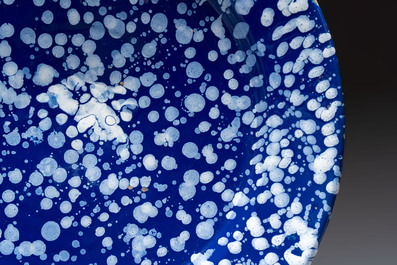 A rare large Nevers white-splashed blue-ground '&agrave; la bougie' dish, France, late 17th C.