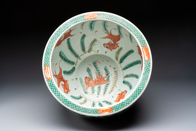 A Chinese famille verte black-ground jardini&egrave;re with birds, antiquities and flowers, 19th C.