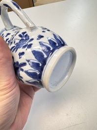 A Chinese blue and white twisted jug with floral design, Kangxi
