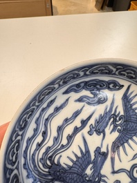 Five Chinese blue and white 'Phoenix' saucers, Wanli mark and of the period