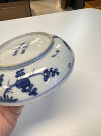 Five Chinese blue and white 'Phoenix' saucers, Wanli mark and of the period