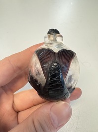 Two Chinese glass snuff bottles and a buffalo bone snuff bottle, Xianfeng mark, 19th C.