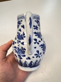 A Chinese blue and white twisted jug with floral design, Kangxi