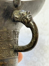 A Chinese archaistic bronze ritual wine vessel, Jue 爵, Qianlong mark, dated 1738