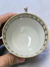 A Chinese Canton famille rose 'Rockefeller Pattern' cup and saucer, 19th C.