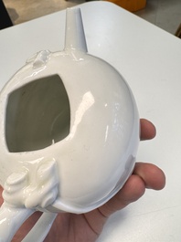 A Chinese Dehua blanc de Chine 'Pomegranate' teapot and cover, Kangxi