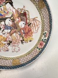 A fine Chinese famille rose eggshell plate with a lady and playing boys, Yongzheng