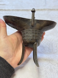 A Chinese archaistic bronze ritual wine vessel, Jue 爵, Qianlong mark, dated 1738