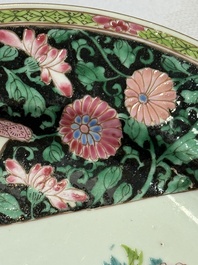 A pair of fine Chinese famille rose black-ground 'Scrolls and Flowers' plates, Yongzheng/Qianlong