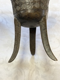 A Chinese archaistic bronze ritual wine vessel, Jue 爵, Qianlong mark, dated 1738