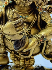A fine Sino-Tibetan gilt-bronze figure of Mahakala, 18th C.