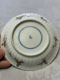A pair of Chinese famille verte cups and saucers with floral design, Jade 玉 marks, 19th C.