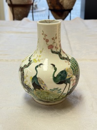 A fine Chinese famille verte 'Peacocks' vase, 19th C.