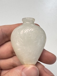 A Chinese carved white jade 'Geese' snuff bottle with a wooden stand, 18/19th C.
