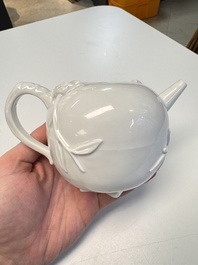 A Chinese Dehua blanc de Chine 'Pomegranate' teapot and cover, Kangxi