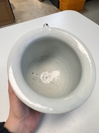 A Chinese blue and white 'Floral' chamber pot, Transitional period