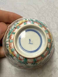 A pair of Chinese famille verte cups and saucers with floral design, Jade 玉 marks, 19th C.