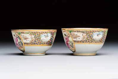 A pair of Chinese Canton famille rose cups and saucers with figural design, Daoguang