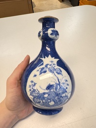 A Chinese blue and white powder-blue-ground hookah base, Kangxi