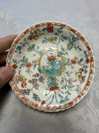 A pair of Chinese famille verte cups and saucers with floral design, Jade 玉 marks, 19th C.