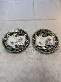 A pair of fine Chinese famille rose black-ground 'Scrolls and Flowers' plates, Yongzheng/Qianlong