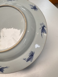 A Chinese blue and white 'La Dame au Parasol' plate after Cornelis Pronk, Qianlong