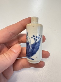 Two Chinese blue, white and copper-red snuff bottles with figural design, 19th C.