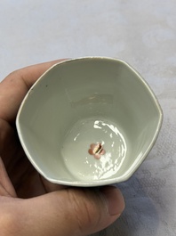 A pair of Chinese gilt-decorated powder-blue-ground 'Antiquities' cups and saucers, lingzhi mark, Kangxi