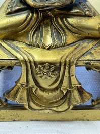 A Sino-Tibetan gilt-bronze figure of Buddha Amitayus, inscribed, Qianlong