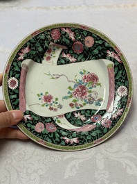 A pair of fine Chinese famille rose black-ground 'Scrolls and Flowers' plates, Yongzheng/Qianlong