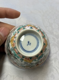 A pair of Chinese famille verte cups and saucers with floral design, Jade 玉 marks, 19th C.