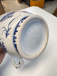 A Chinese blue and white 'Floral' chamber pot, Transitional period