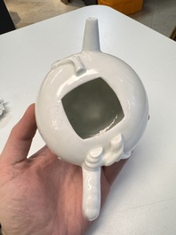 A Chinese Dehua blanc de Chine 'Pomegranate' teapot and cover, Kangxi